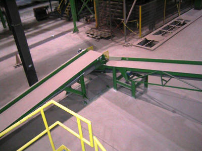 Slider bed belt conveyors handling scrap material from a clay brick extrusion line.