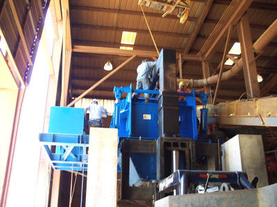 Setting a Williams 370 Traveling Breaker Plate TBP Mill on its crusher platform.