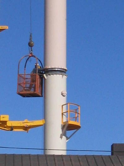 Connecting the top and bottom sections of a 101' freestanding exhaust stack with top expansion.