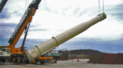 Lifting to vertical a 60' tall, 72" OD base section of a 130' tall freestanding double-wall insulated exhaust stack.
