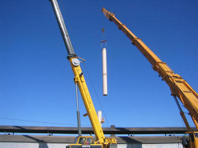 Setting the top section of a 101' freestanding exhaust stack at 131' radius.