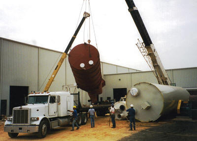 Lifting a venturi reactor for installation in a flue gas scrubber system.