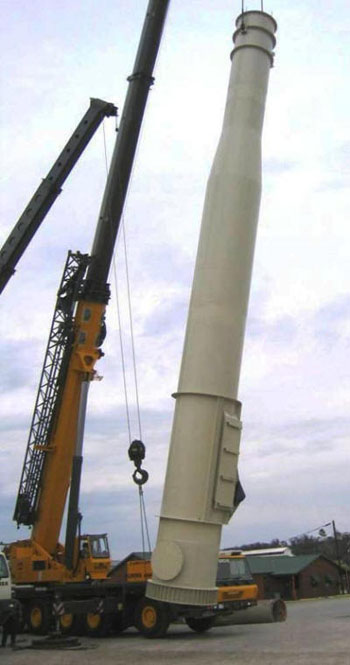 Lifting to vertical a 60' tall, 72" OD base section of a 130' tall freestanding double-wall insulated exhaust stack. 