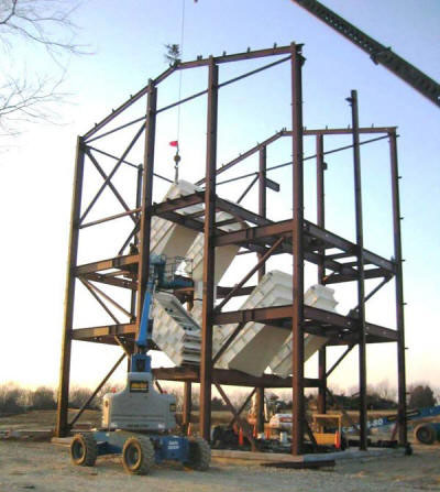 Four, triple 5’x10’ over triple 5’x10’ screens and related equipment in a custom screen tower structure for a frac sand plant.
