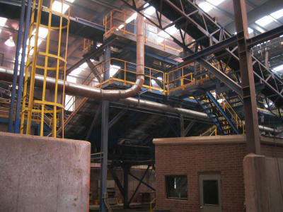 View of a clay products grinding room at a brick plant.