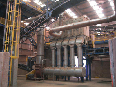 Dust collection system for a 150 ton per hour clay grinding room.