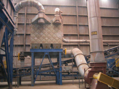 Dust collection system for a clay materials blending system including eight 150 ton capacity storage silos, feeders, various conveyors with transitions and a pugmill.