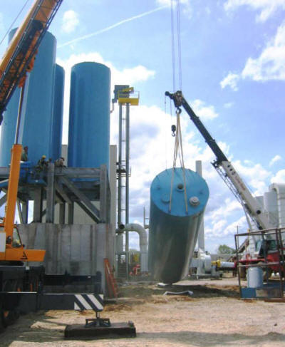 Turnkey silo support structure and four 200 ton capacity frac sand silos in a seismic 3 zone.